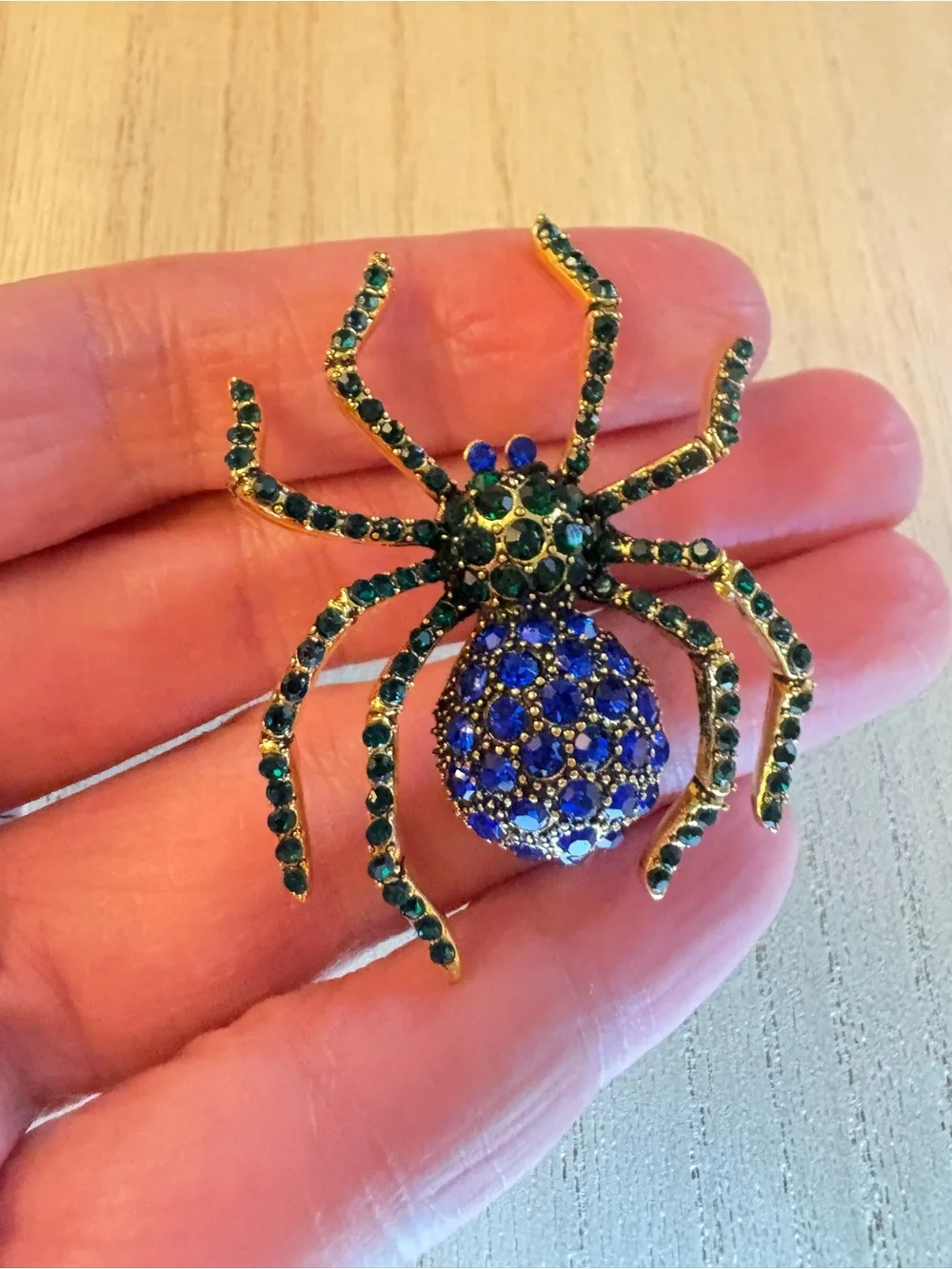 Gold-tone Spider Brooch with Blue and Green Rhinestones